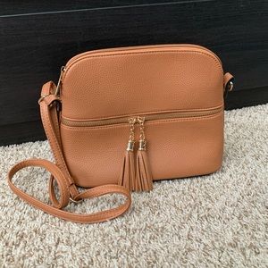 Tan leather crossbody bag